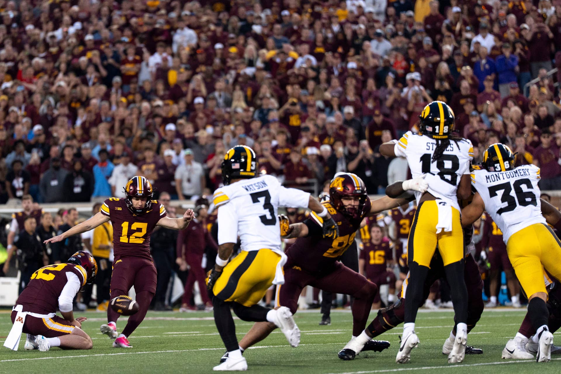 Gophers crowd storms field after upset win over No. 15 Iowa - Bring Me ...