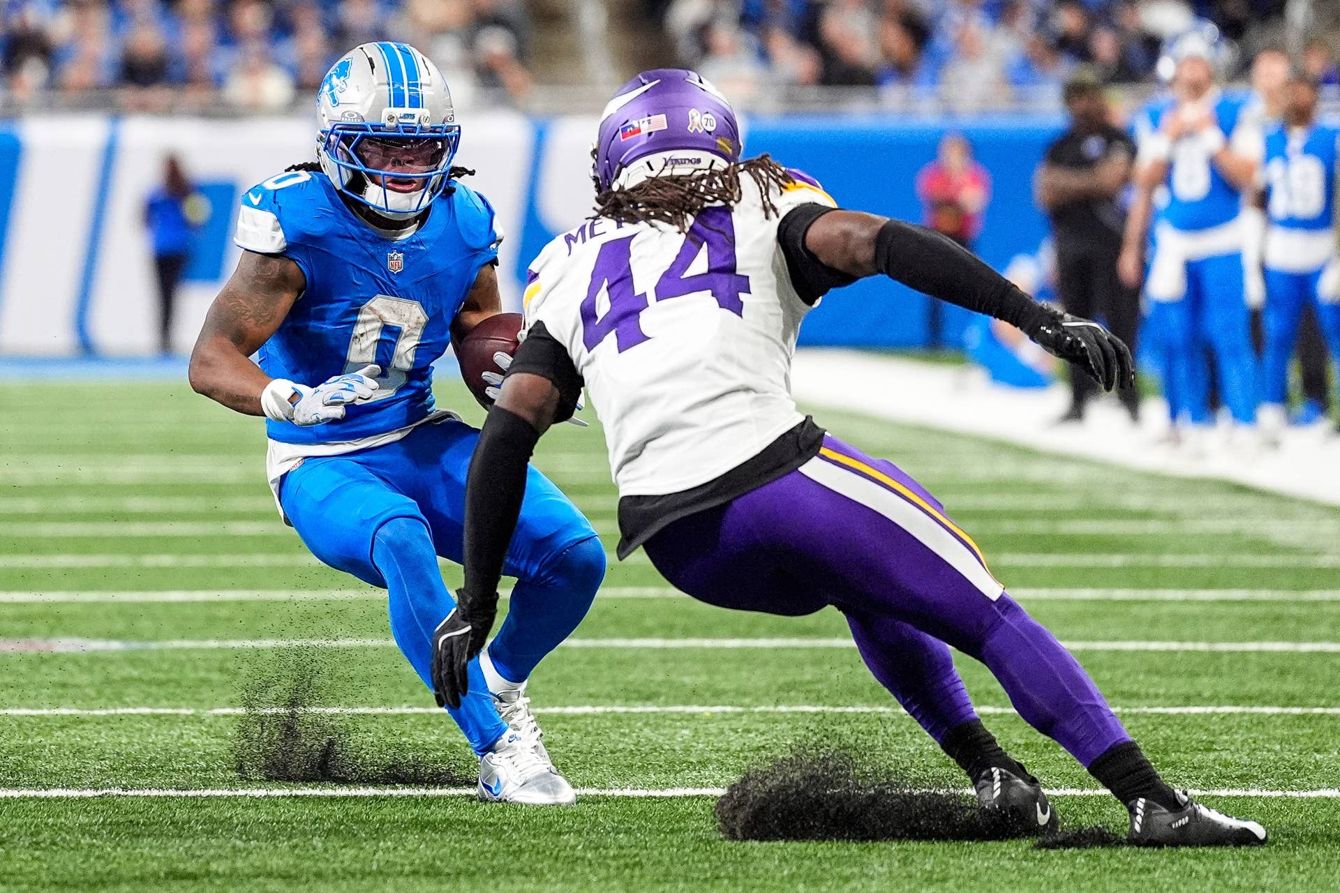Detroit lions running back jahmyr gibbs runs against minnesota vikings safety joshua metellus during the second half at Detroit lions running back jahmyr gibbs runs against minnesota vikings safety joshua metellus during the second half at